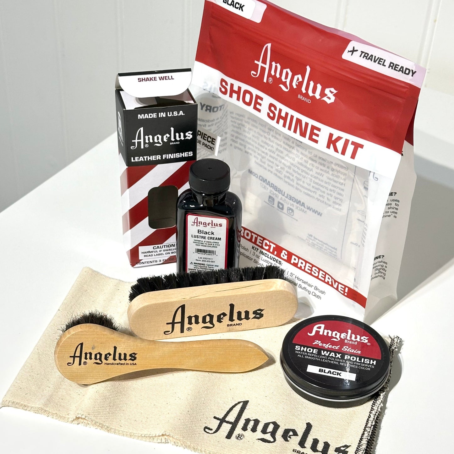 Angelus shoe shine kit contents brushes, shoe polish cloth and packaging