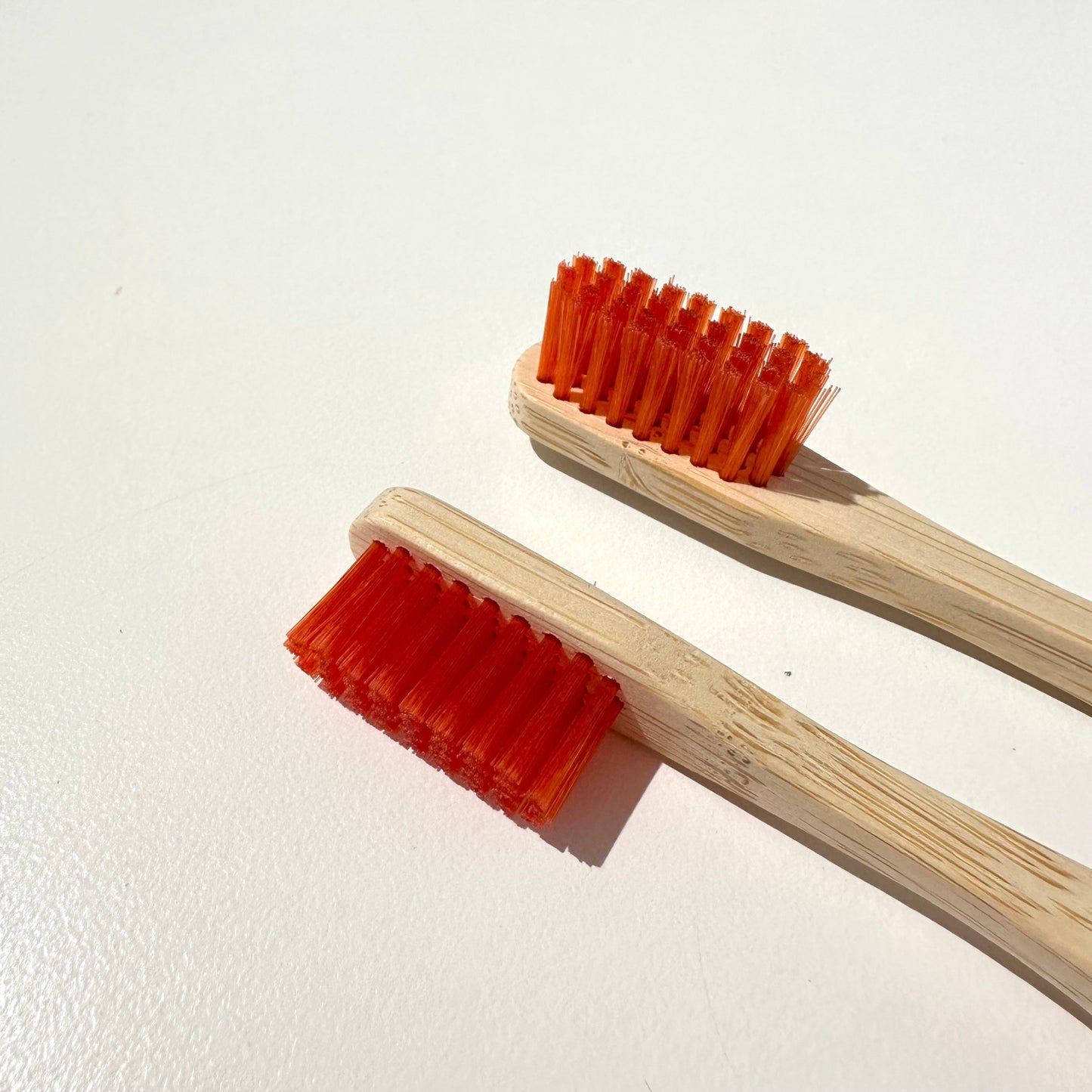 Red bristle detail brush wooden handle