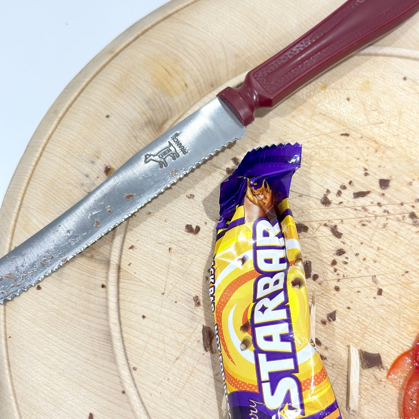 Knife on a board with star bar wrapper