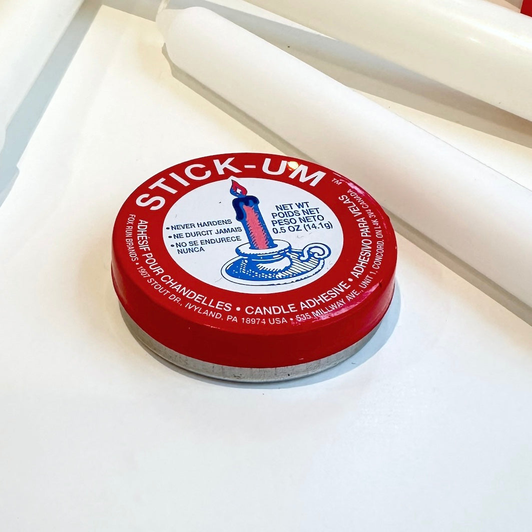 Candle adhesive