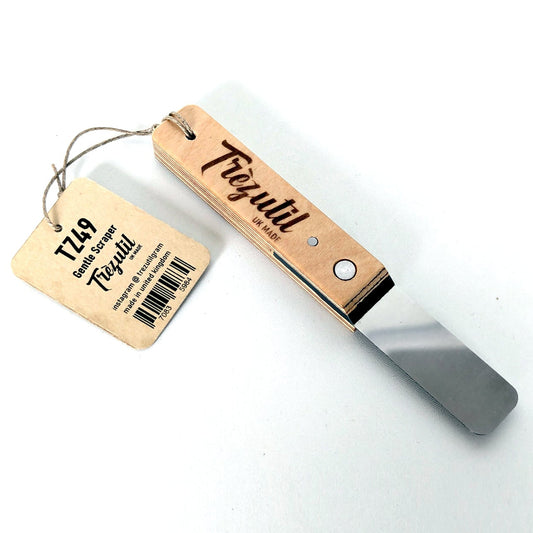 Hand made flexible scraper in steel and wood