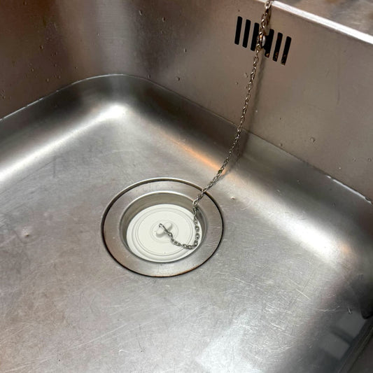 Universal bath and sink plug - utilitybrighton