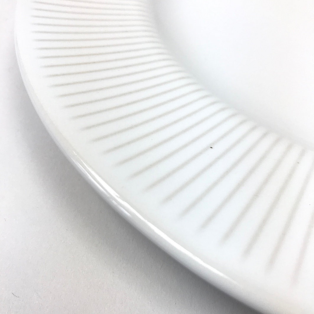 Ribbed off white plates