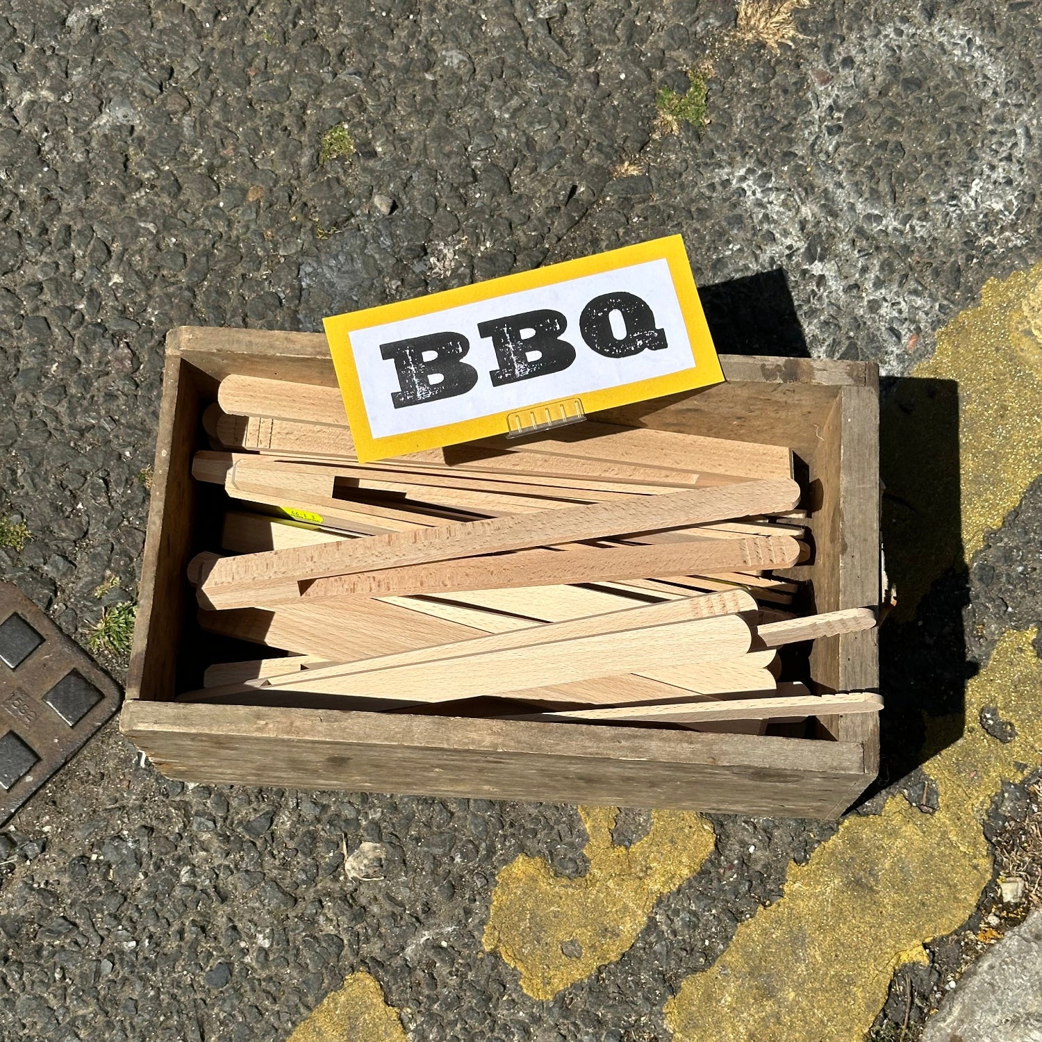 Wooden tongs in a box