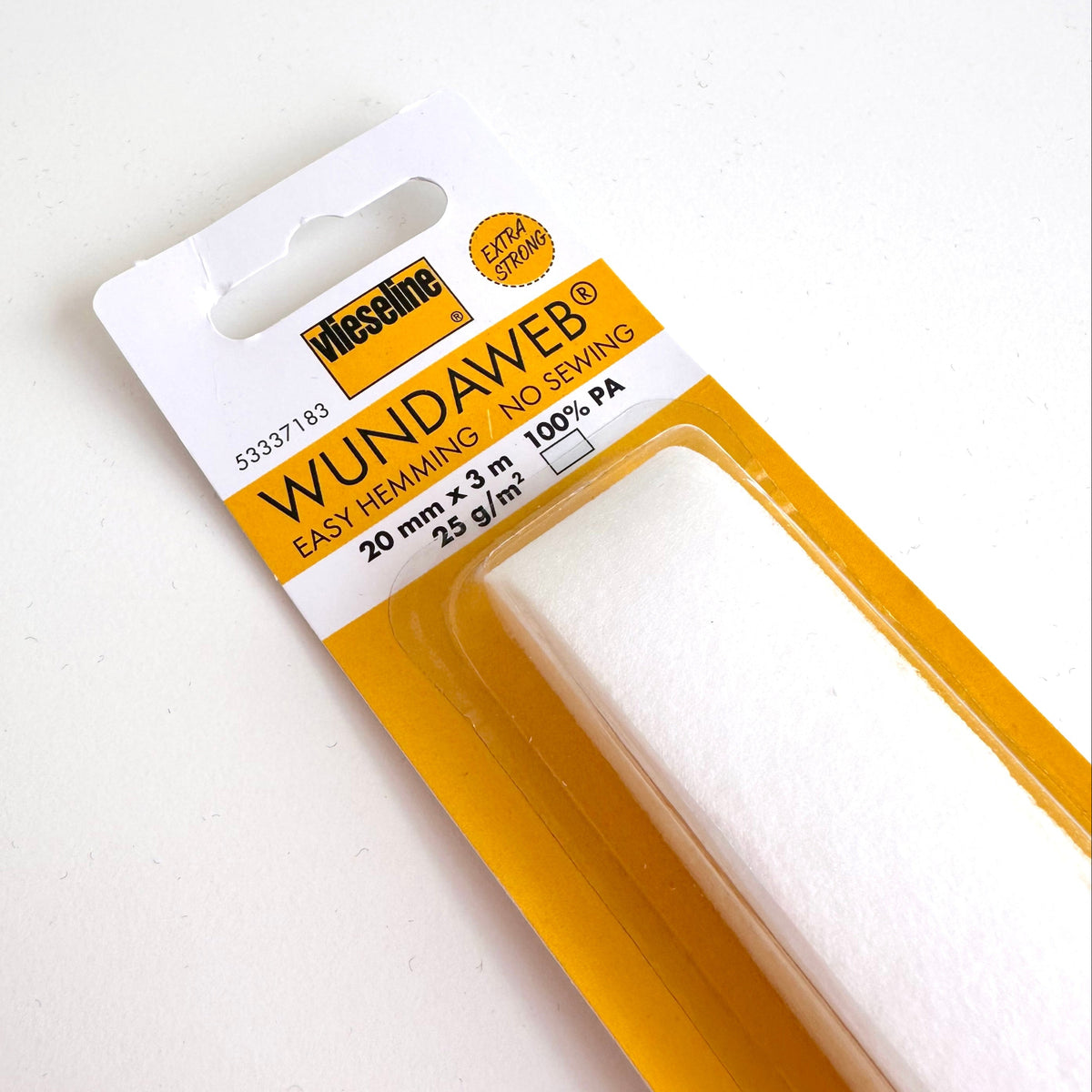 WundaWeb 20 mm x 3 in (50.8 mm) white hemming web in its original yellow and white blister packaging, shown on a clean white background.