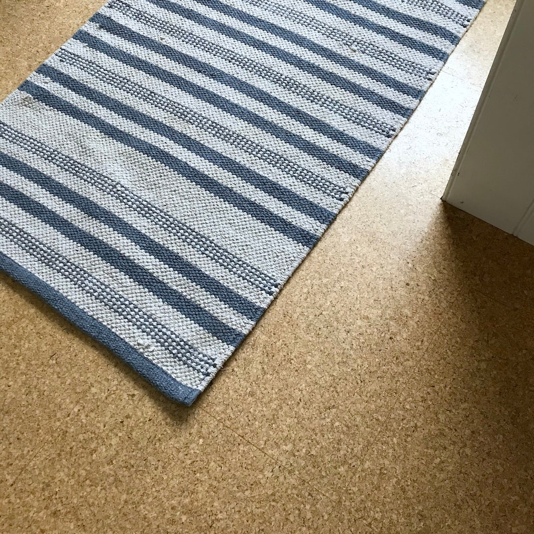 Bathroom mat blue and white cork floor