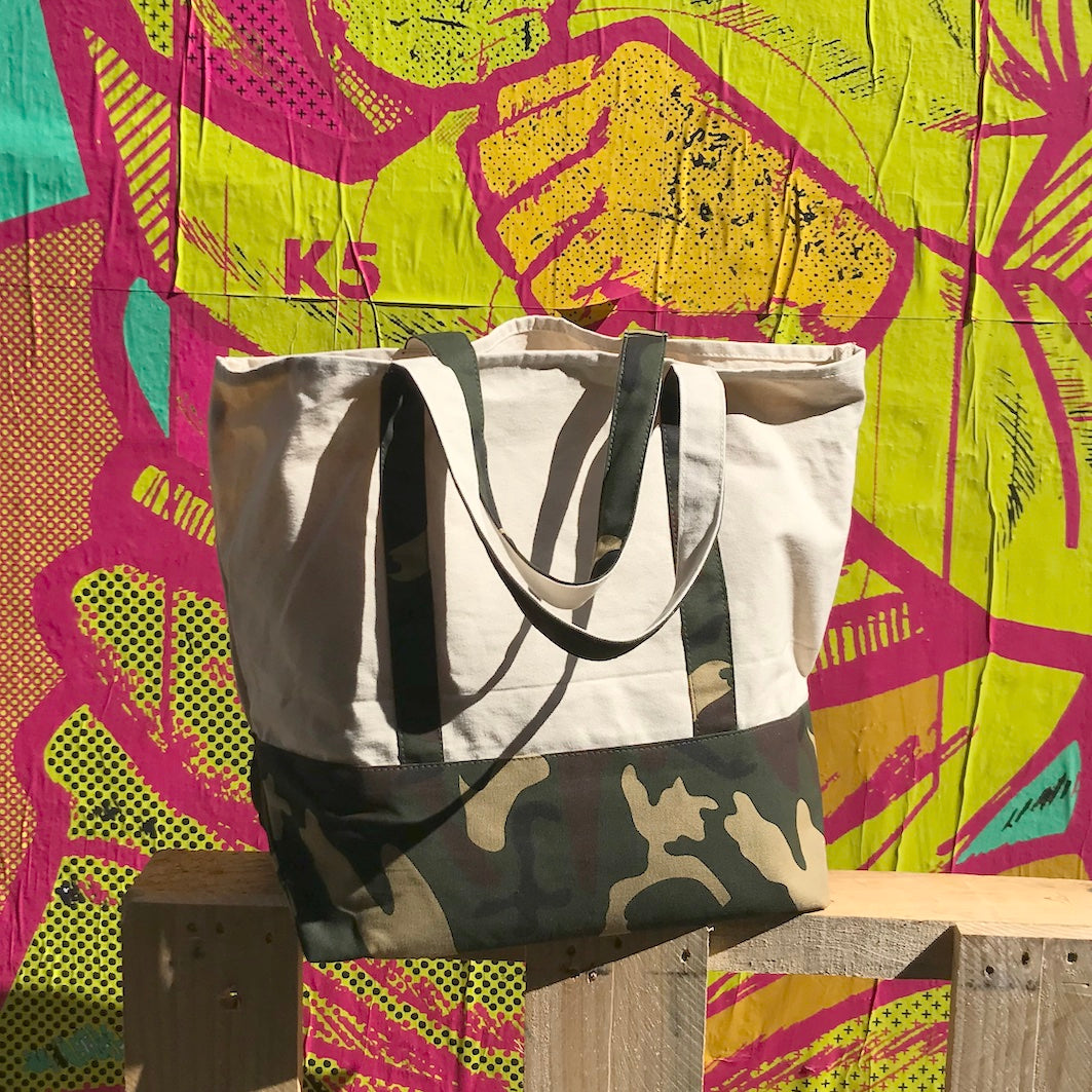 Canvas tote bag with camouflage details bright background