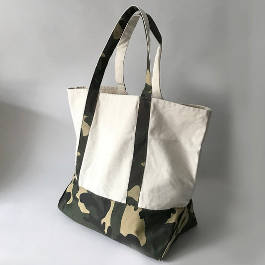 Canvas tote bag with camouflage details and handles