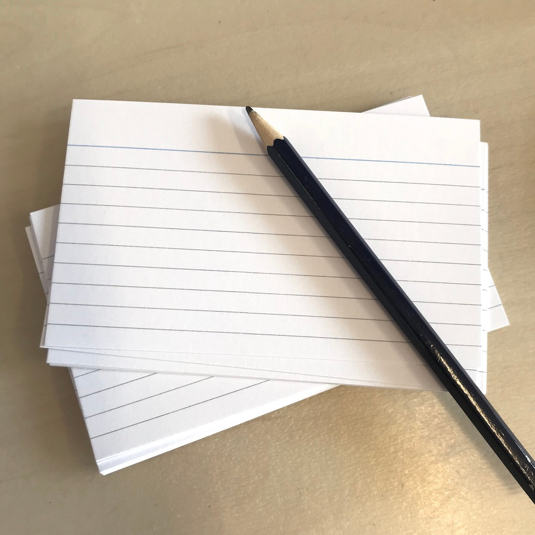 Record cards and pencil