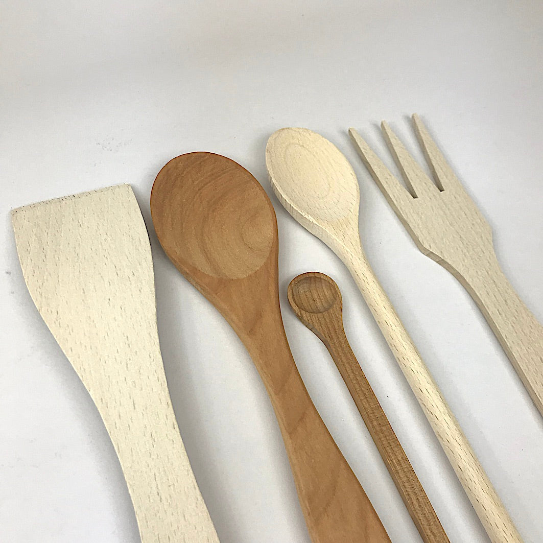 Wooden utensils and spoons lineup