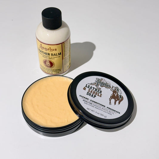 Angelus leather care products including balm, soap, and bottle on a white background
