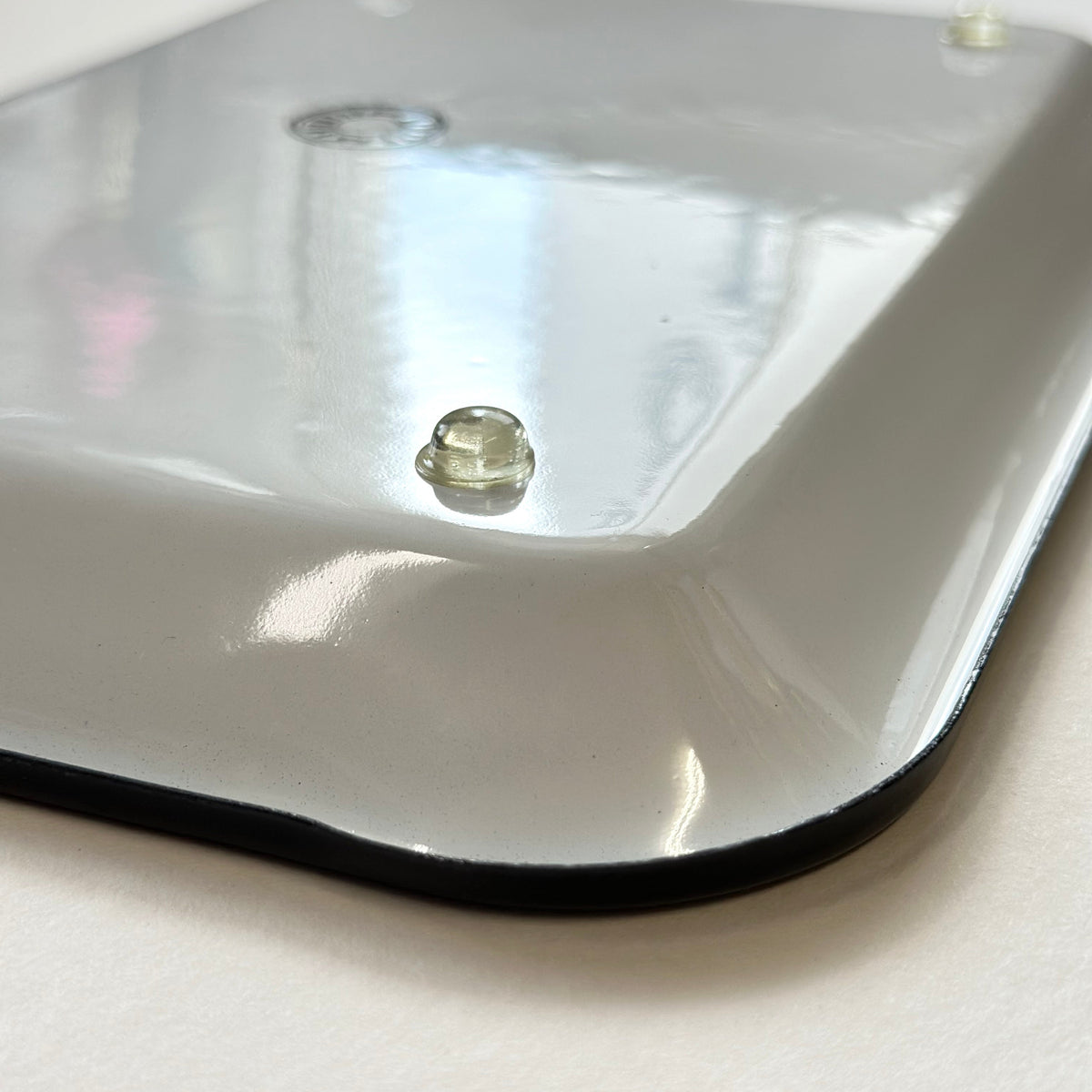 Back of Utility enamel tray showing feet detail