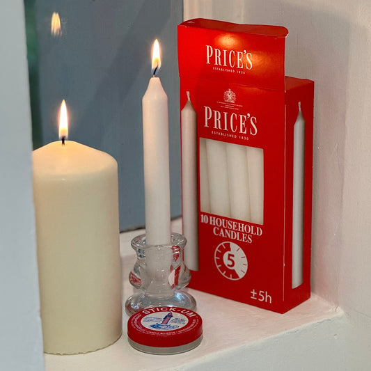 Candles on a window sill lit