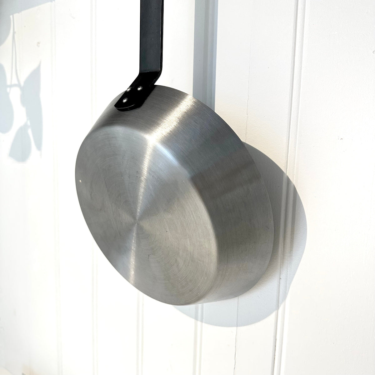 Carbon steel frying pan hanging up