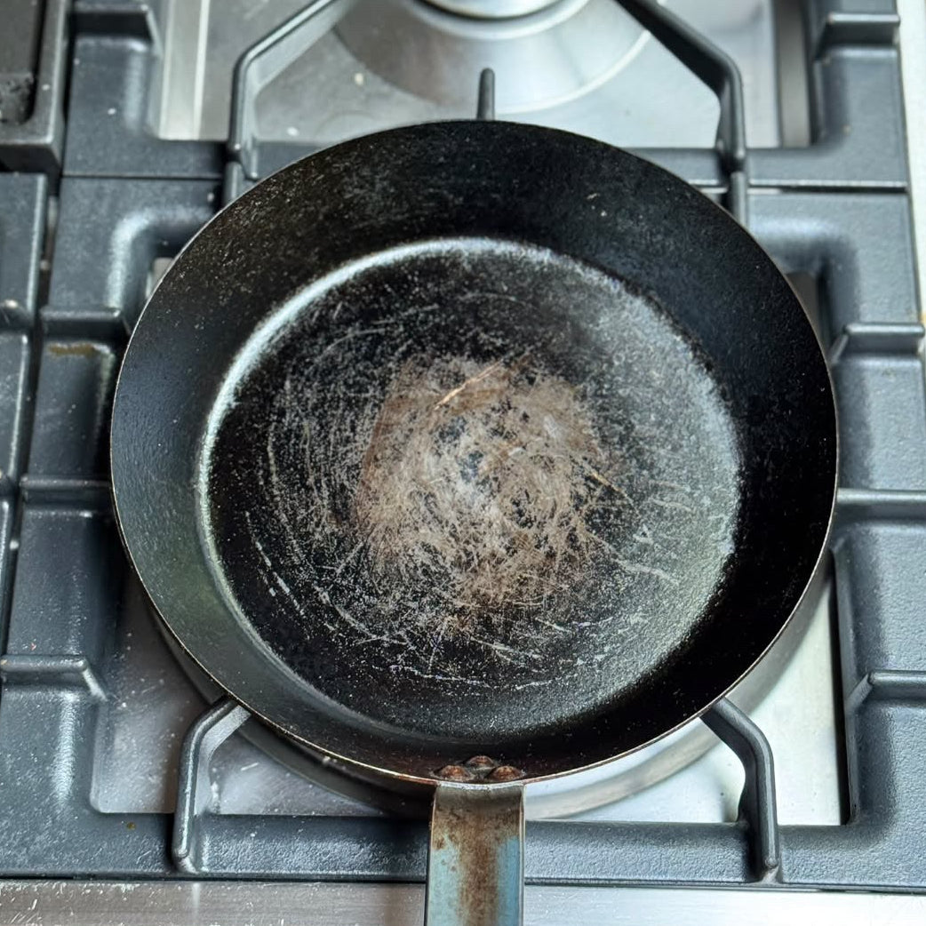 Carbon steel pan on hob
