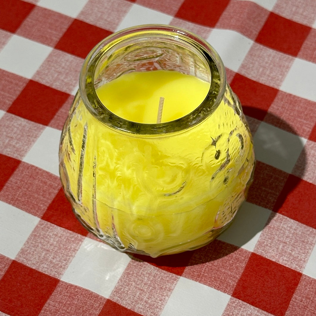 citronella glo lite candle lantern on gingham tablecloth