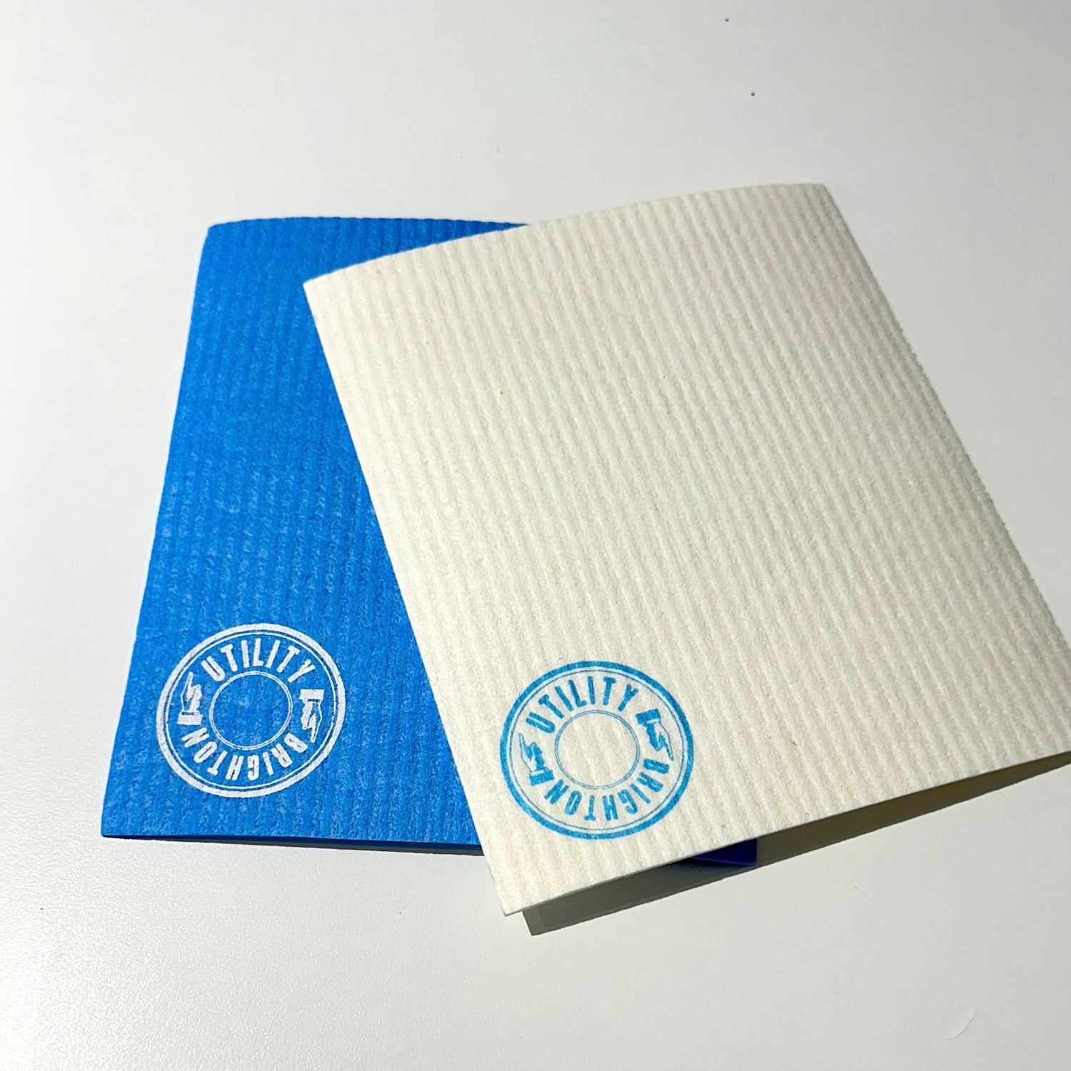 Swedish dishcloths blue and white on a white background