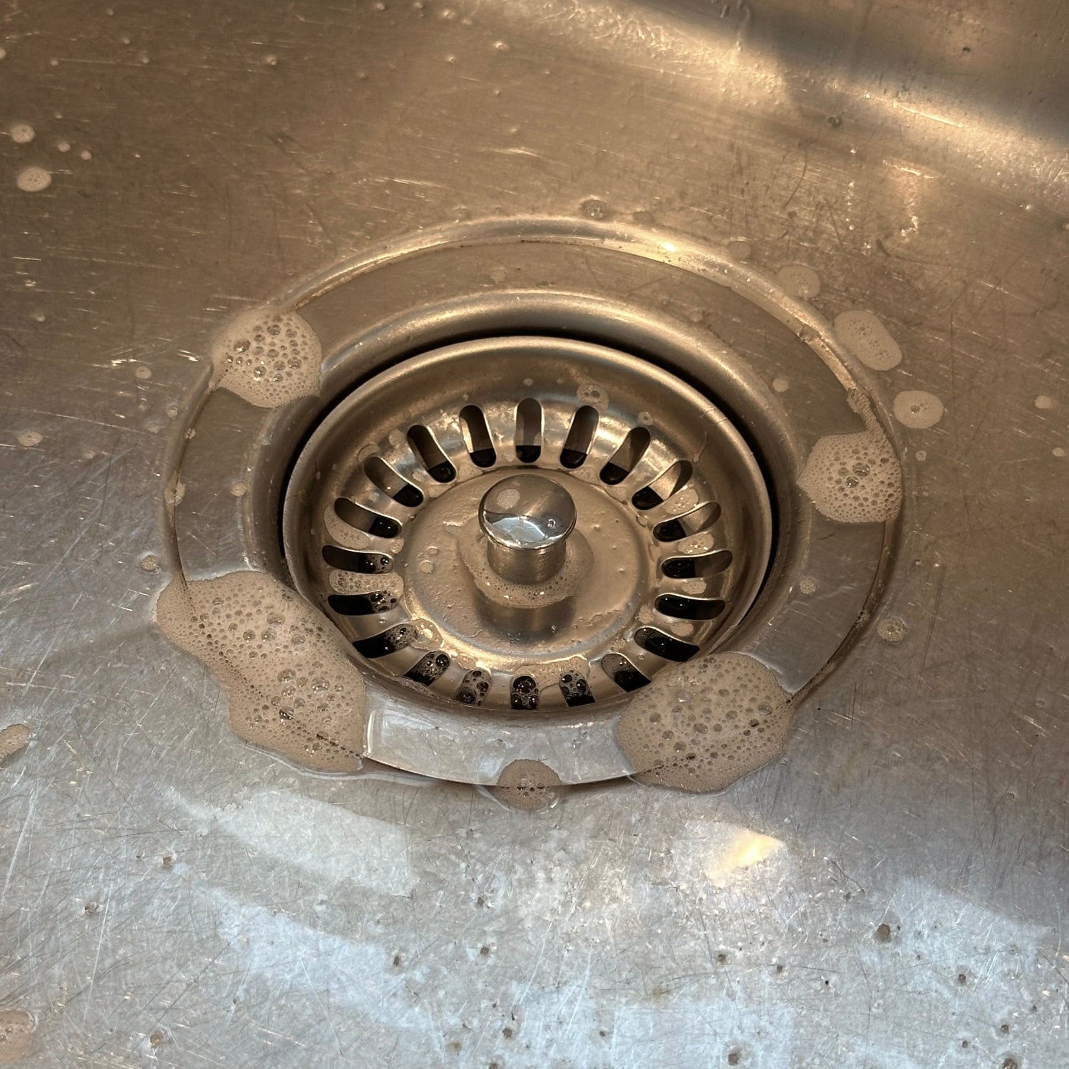 Kitchen sink strainer with bubbles detail of sink