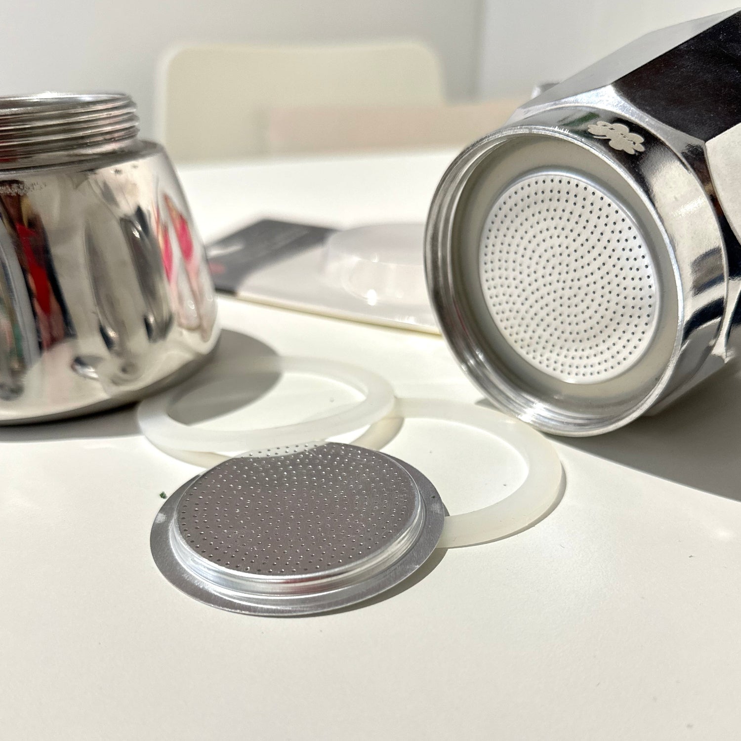 Moka pot espresso coffee makers spares detail of filter and rubber gaskets