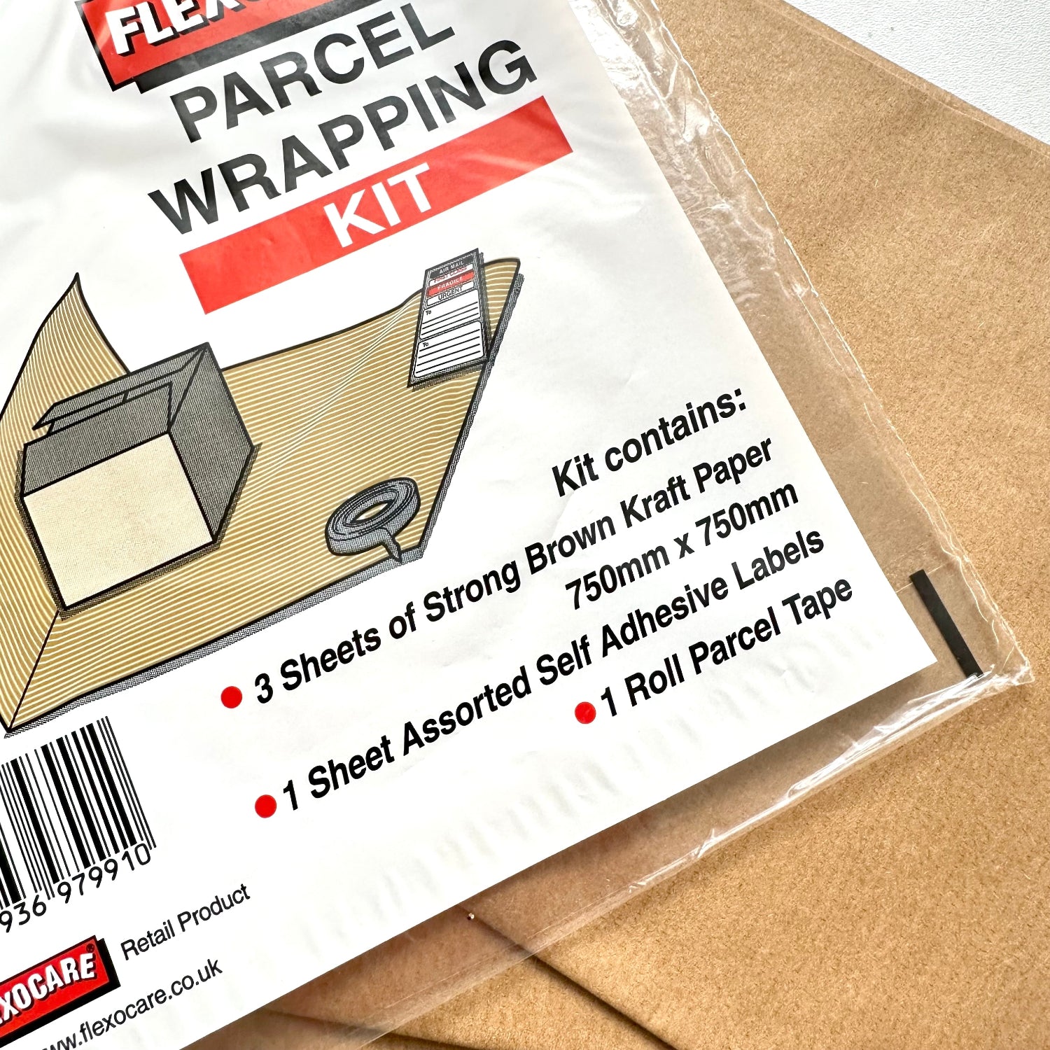 FlexoCare parcel wrapping kit with brown kraft paper and adhesive labels.