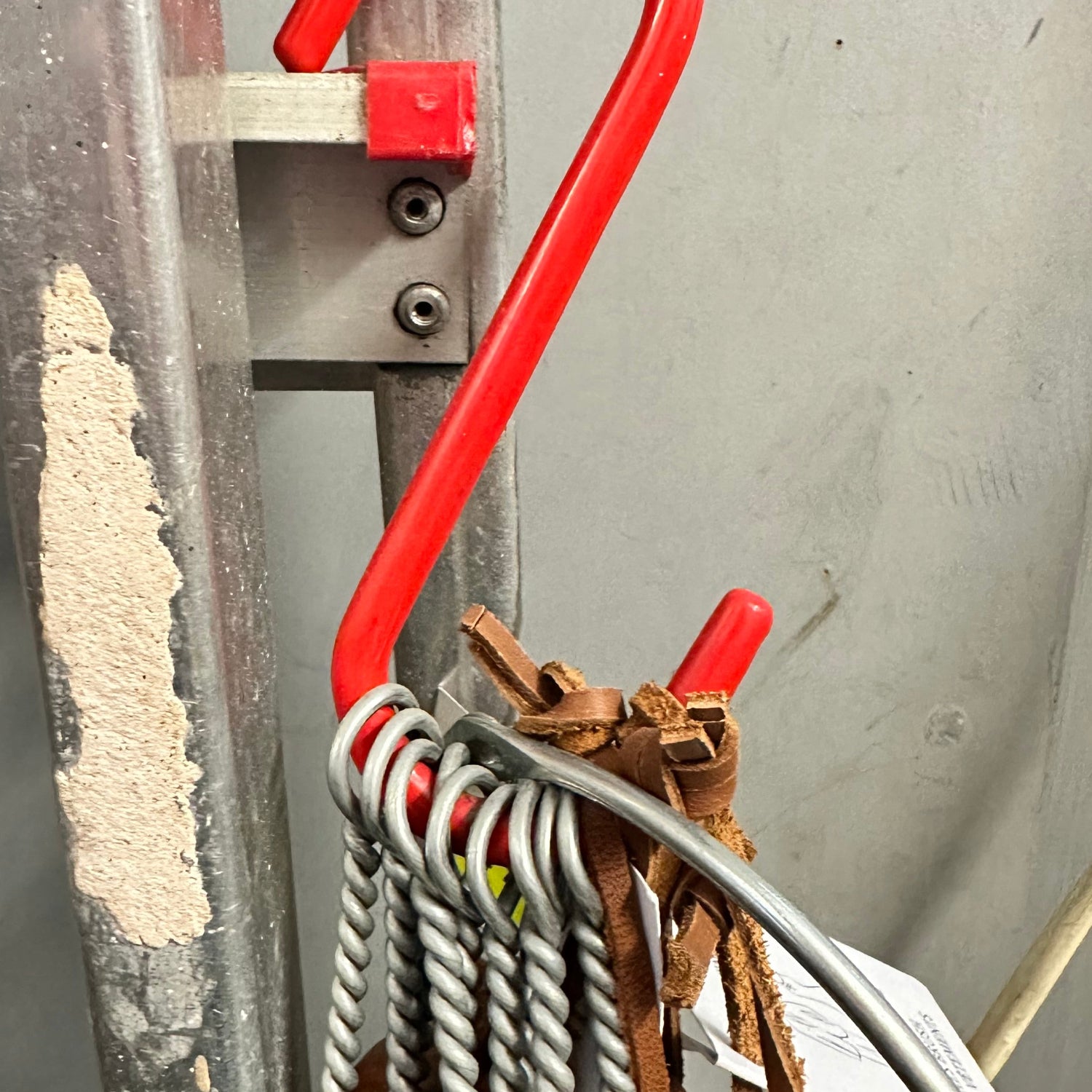 Red S hook holding tools