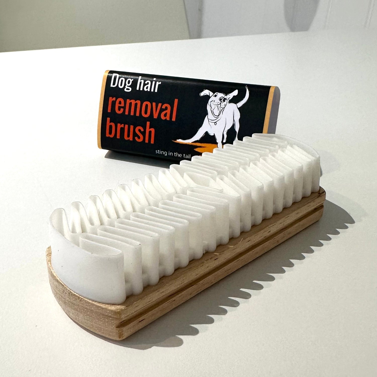 Rubber lint remover on a white table