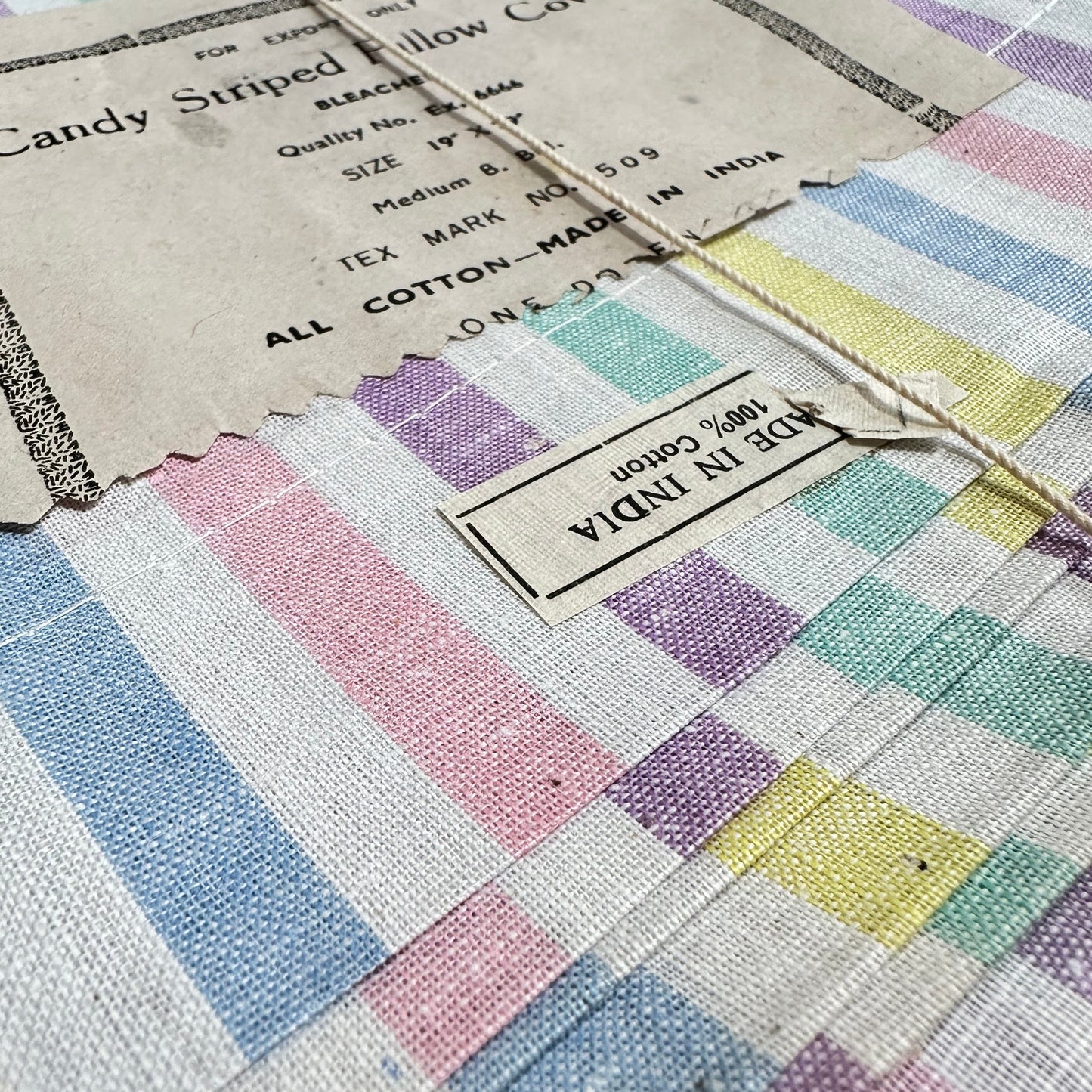 Striped pillowcases details with string and label