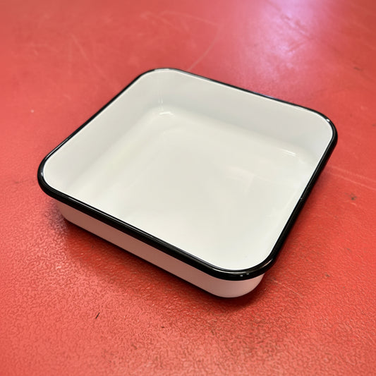 Utility enamel square pan red background. Enamel, white with black rim