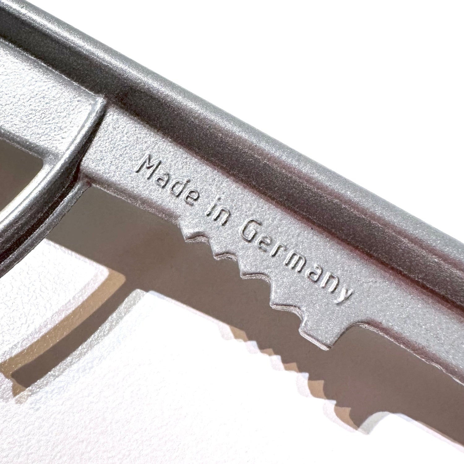 Metal tool with 'Made in Germany' engraving on a white background