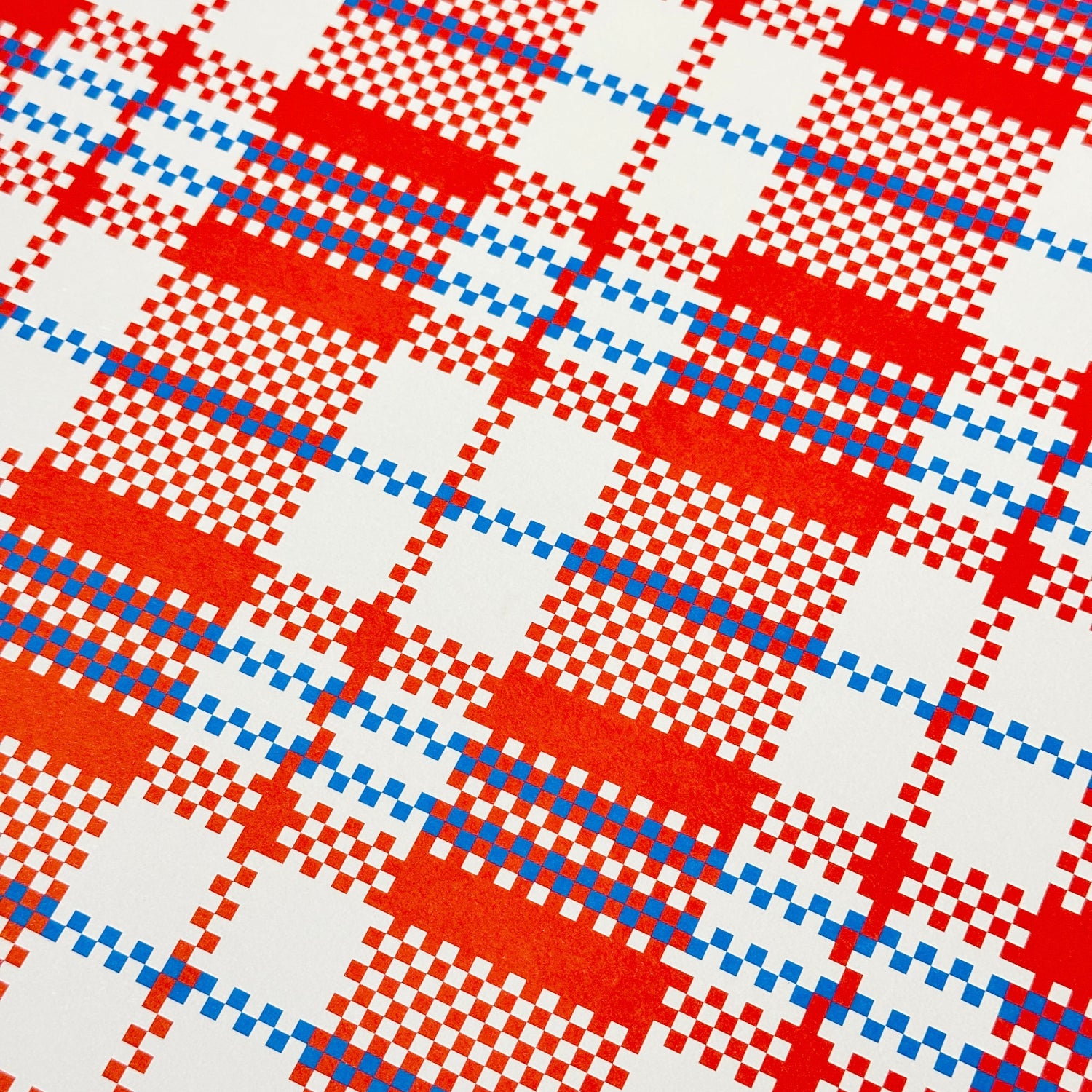 Patterned fabric with red, white, and blue checkered design