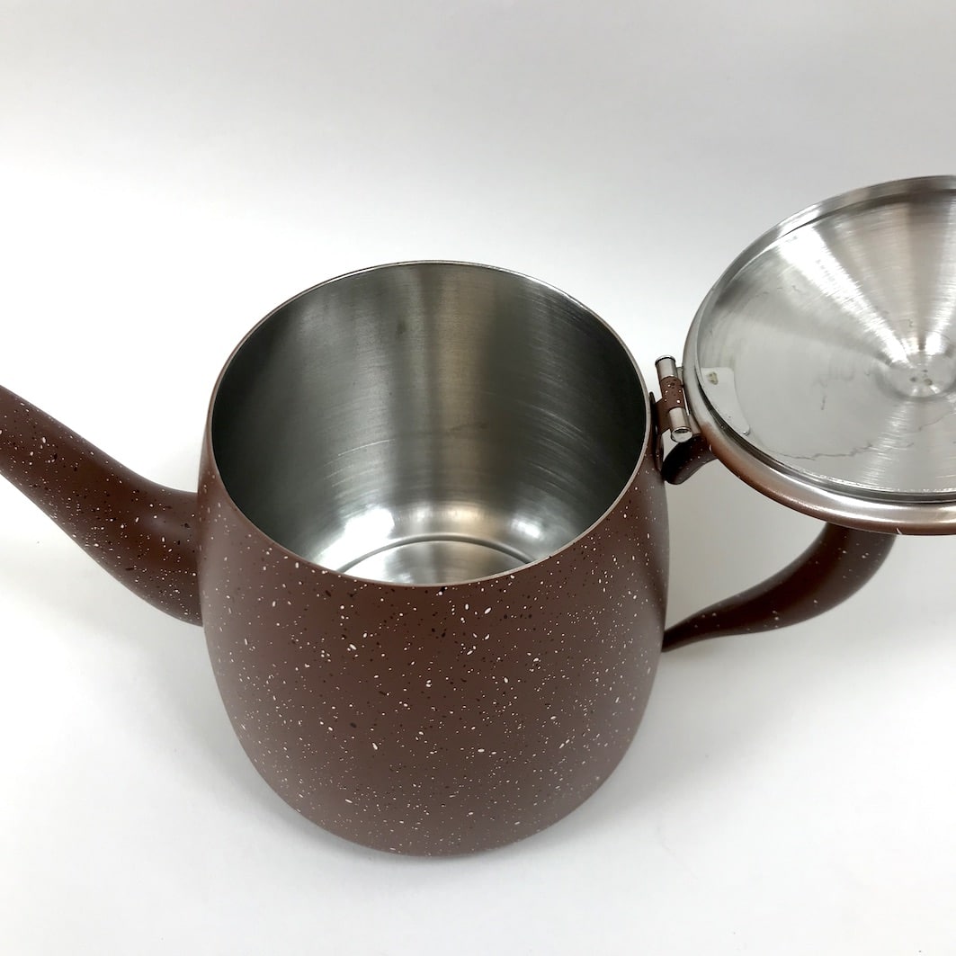 Brown speckled teapot inside