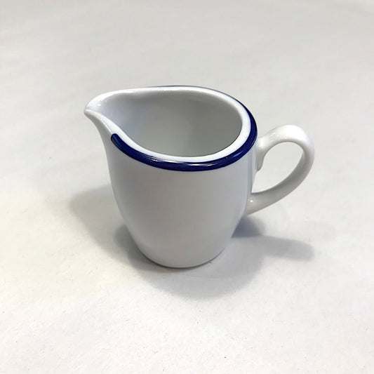 Porcelain white jug blue rim