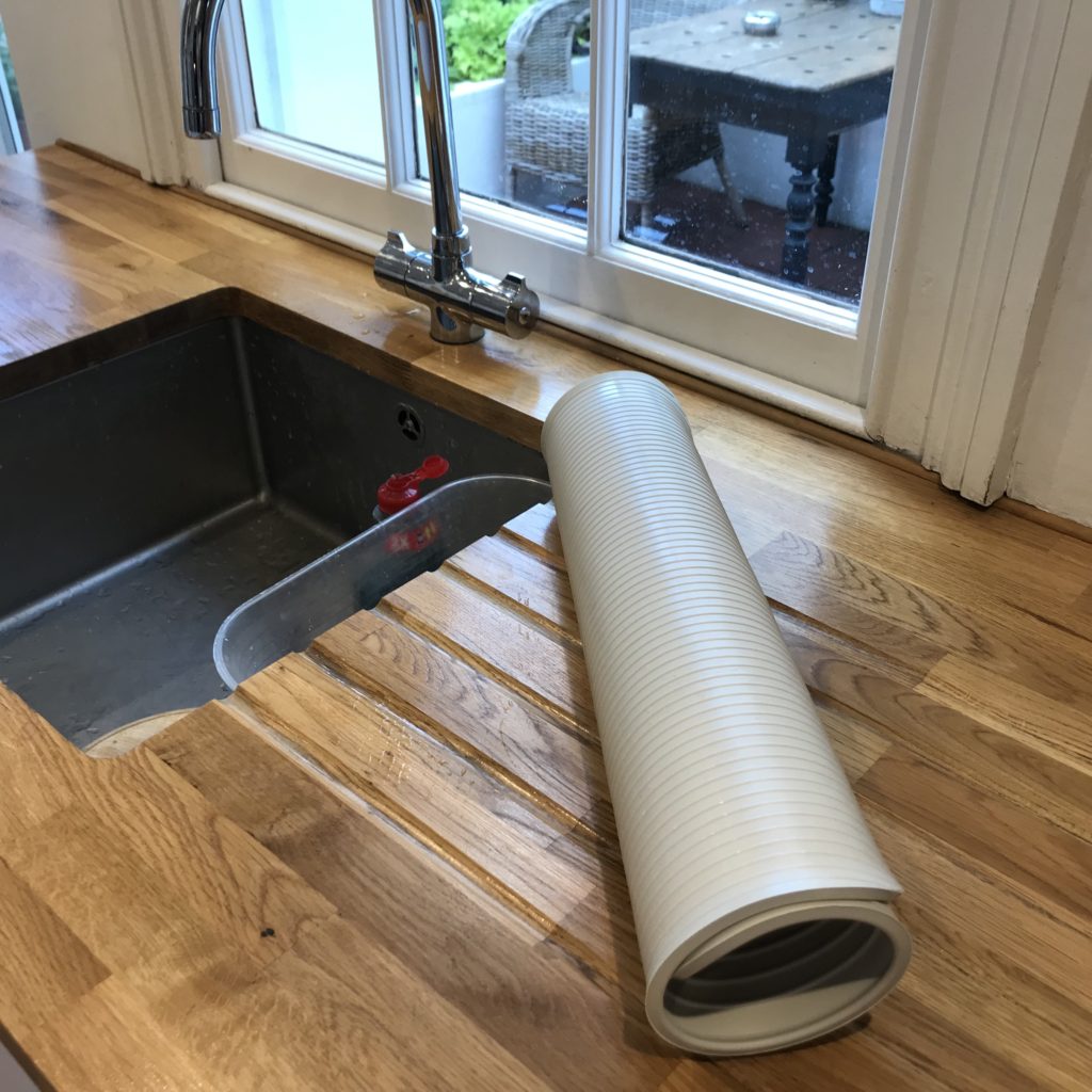 Rubber draining mat sink rolled