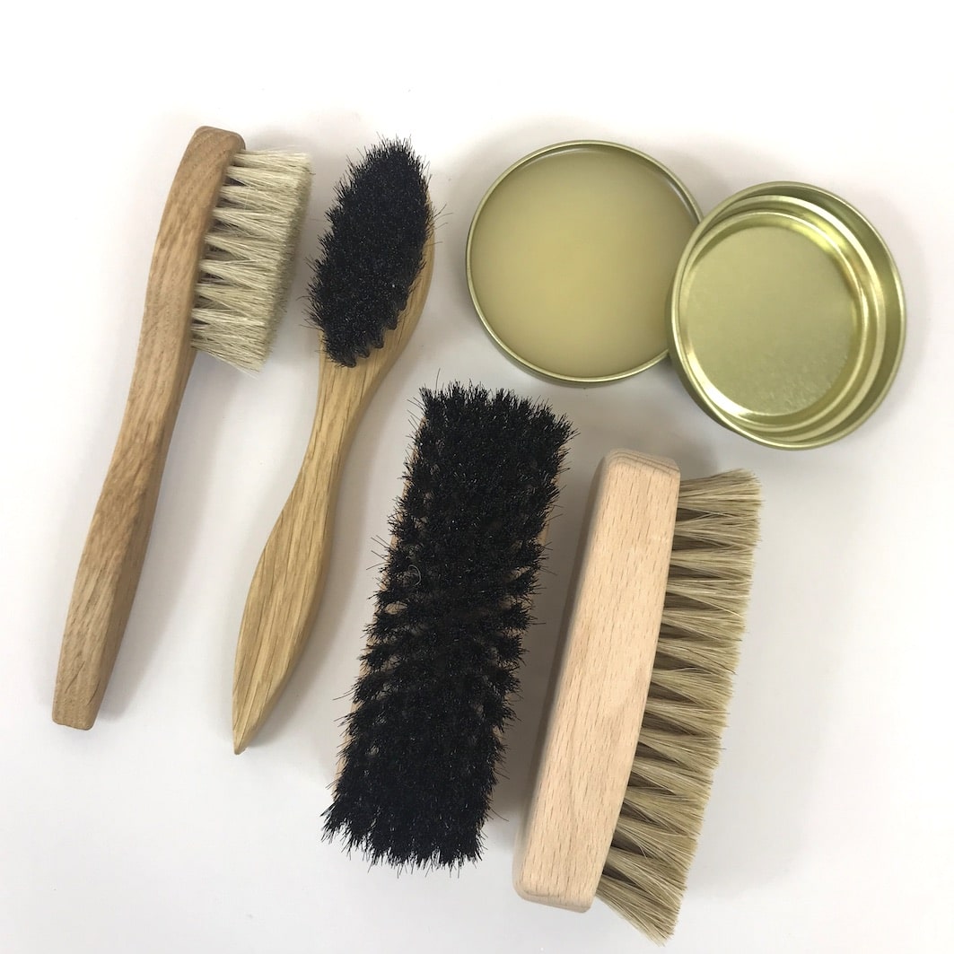 Shoe polishing brushes and dubbin