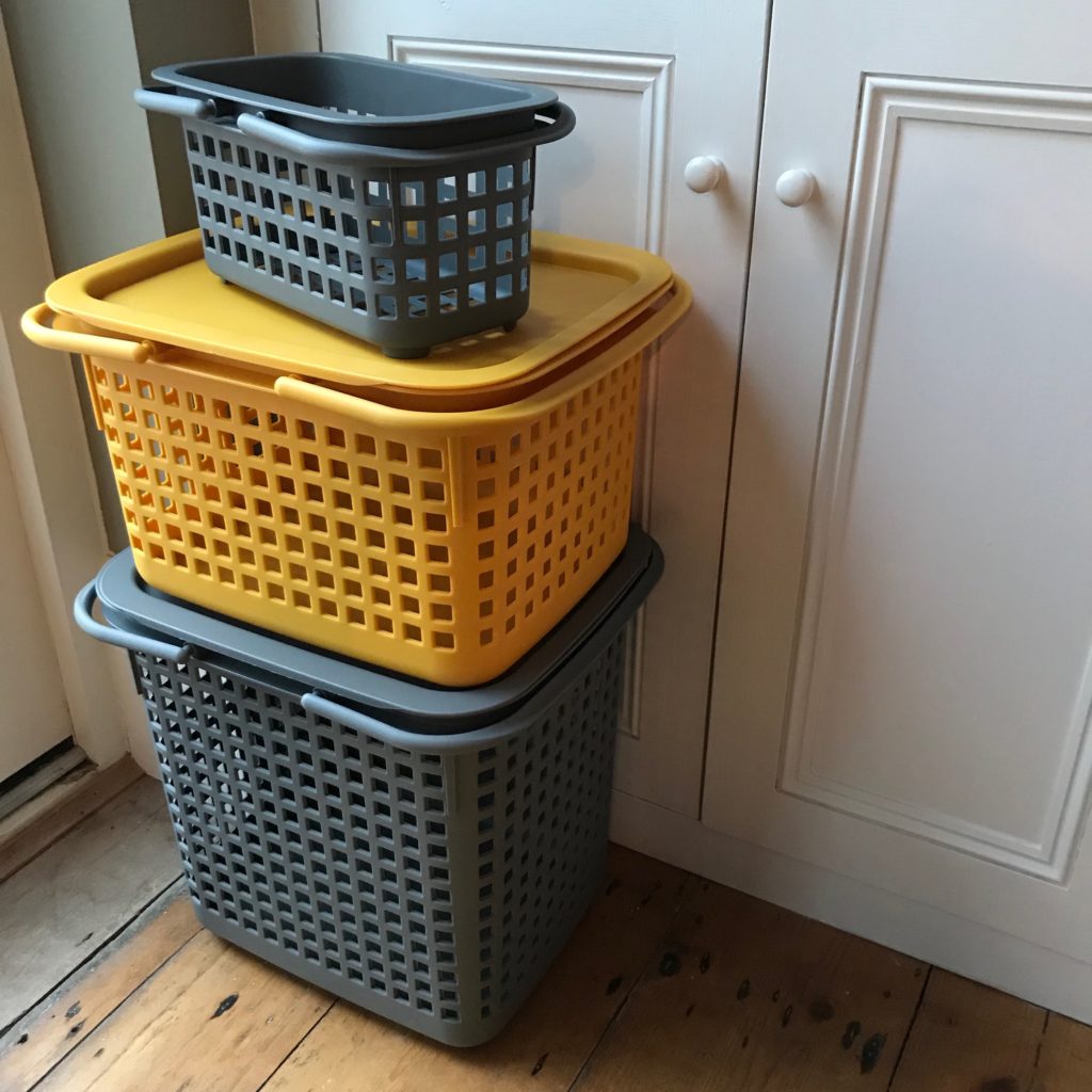 Stacking storage baskets grey and mustard interior angle