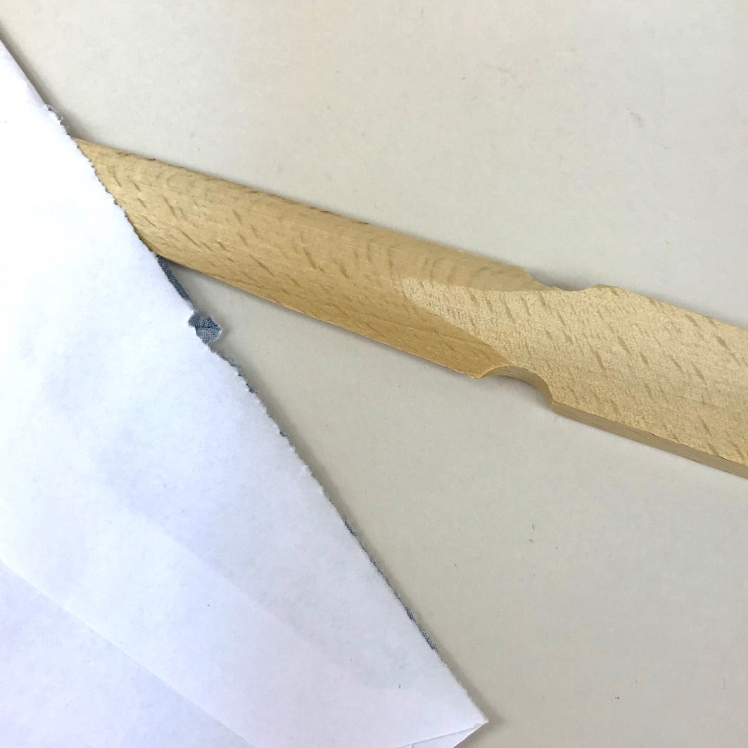 Wooden letter opener and opening
